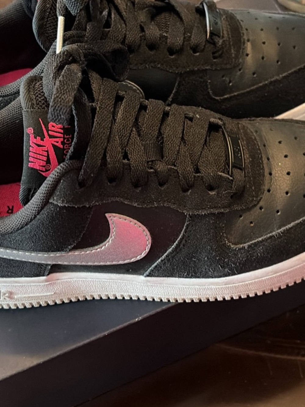 Nike Black Low-Top Sneakers with Pink Swoosh